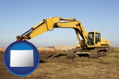 colorado map icon and excavation project equipment