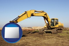 wyoming map icon and excavation project equipment